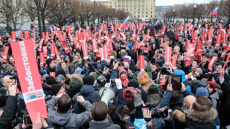 Supporters of Russian opposition leader Alexei Navalny attend a rally on Sunday calling for a boycott of the presidential election. Photograph: Reuters