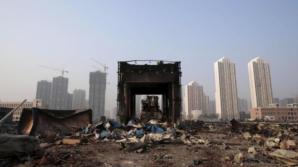 A damaged building is seen among debris at the site of Wednesday night’s explosions in Tianjin. Photograph: Reuters/China Daily