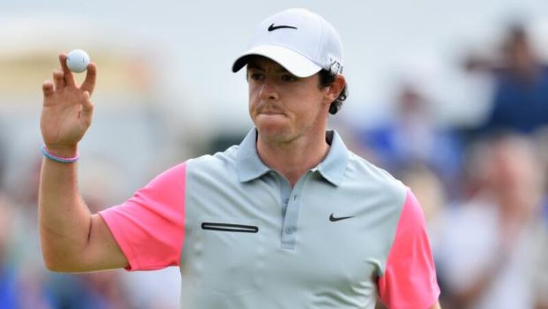 Rory McIlroy of Northern Ireland reacts to his birdie putt on the ninth green during the final round of The 143rd Open Championship at Royal Liverpool in Hoylake. Photograph: Stuart Franklin/Getty Images