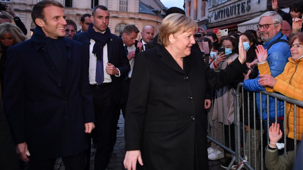 France’s president Emmanuel Macron and outgoing German chancellor Angela Merkel upon their arrival prior to talks in Beaune, eastern France, on Wednesday. Photograph: EPA/Philippe Desmazes