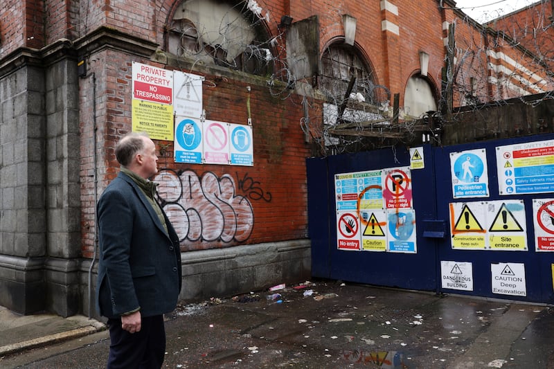 Ned Guinness outside the former Iveagh Markets in the Liberties. 
Photograph: Laura Hutton