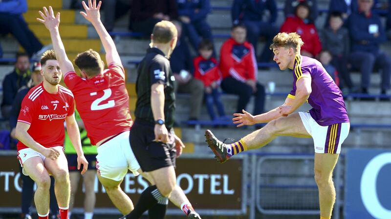 Martin O’Connor scores a point during Wexford’s defeat to Louth. Photograph: Ken Sutton/Inpho