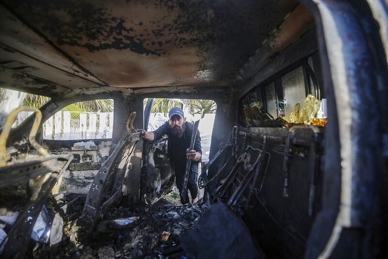 A destroyed World Central Kitchen car on Al Rashid road, between Deir al-Balah and Khan Younis in the southern Gaza Strip. Photograph: Mohammed Saber/EPA