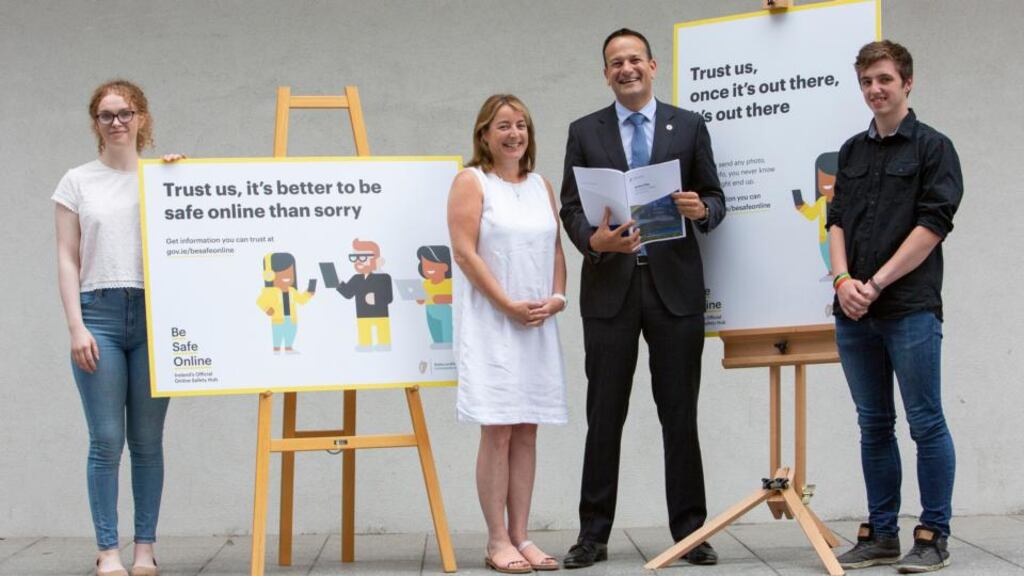Taoiseach Leo Varadkar and Áine Lynch from the National Parents Council (centre) with Webwise Youth Advisory Panel members Rachel Murphy (18) and Marco Messori (18) help launch the Government’s Action Plan for Online Safety.