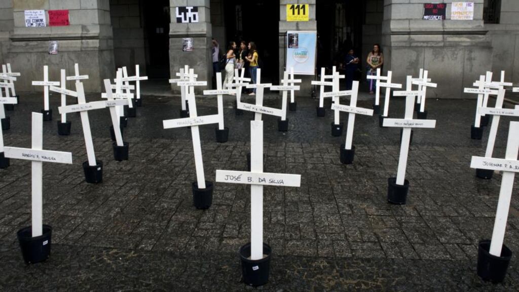 Crosses stand at the University of Sao Paulo in memory of the 111 inmates killed in a clampdown of a prison rebellion at the Carandiru Penitentiary in the city in 1992. Photograph: Nelson Almeida