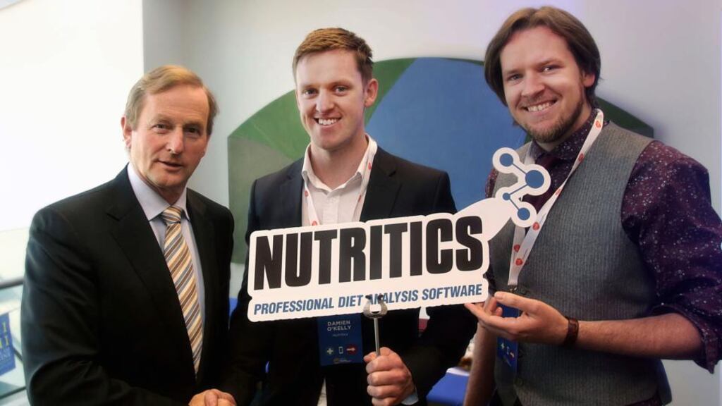 Taoiseach Enda Kenny meets the men behind Nutritics, Damian and Ciaran O’Kelly, at HealthXL Dublin’s Global Gathering Investor Day at Trinity Biomedical Building. Photograph: Conor McCabe