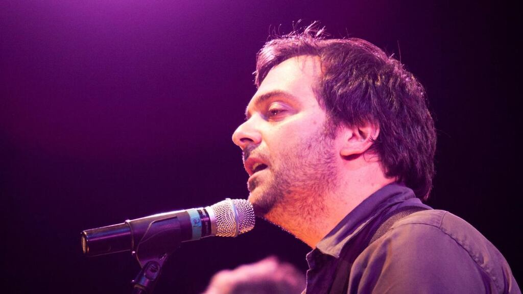 FILE -- Adam Schlesinger performs with the string quartet Ethel, at Damrosch Park in New York, July 28, 2010. Schlesinger, a singer-songwriter for the bands Fountains of Wayne and Ivy who had an award-winning second career writing songs for film, theater and television, died on Wednesday, April 1, 2020. He was 52. The cause was complications of the coronavirus, said Josh Grier, his lawyer. (Brian Harkin/The New York Times)
