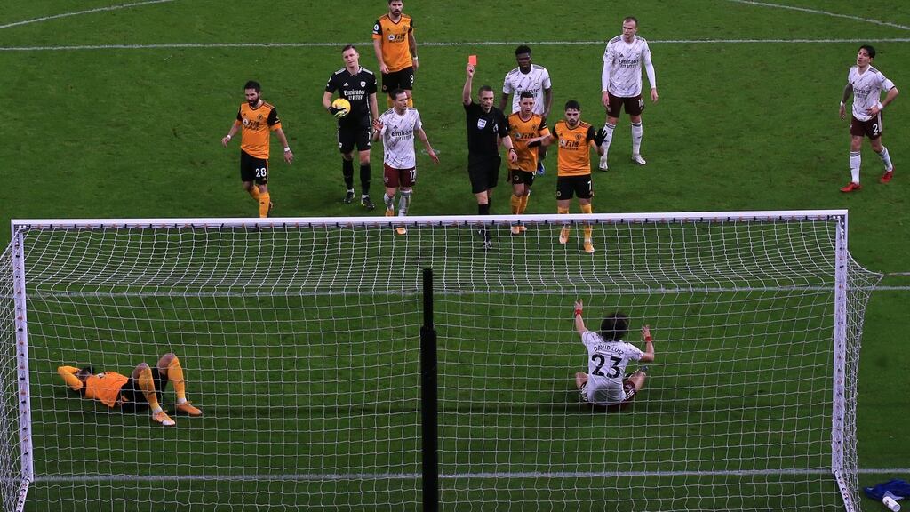 David Luiz is shown a red card during Arsenal’s defeat to Wolves. Photograph: Nick Potts/Getty/AFP