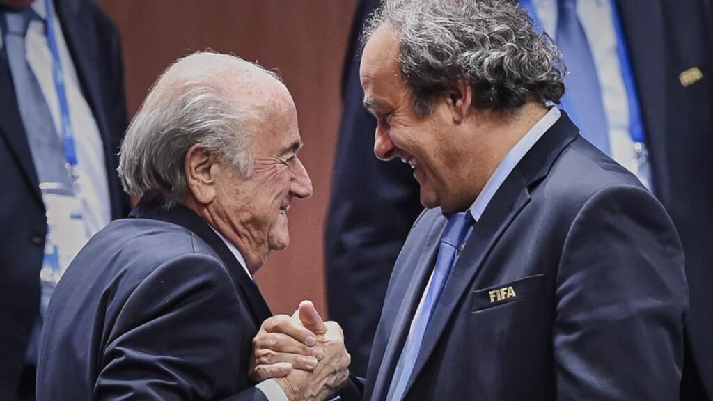 Fifa president Sepp Blatter and the favourite to replace him, Michel Platini. Photograph: Getty Images