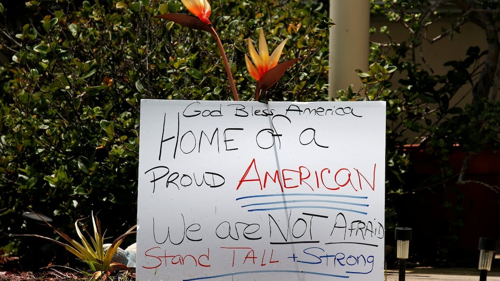 A sign  in front of a house across the street from Omar Mateen’s home in Port Saint Lucie, Florida, US. Photograph: Carlo Allegri/Reuters