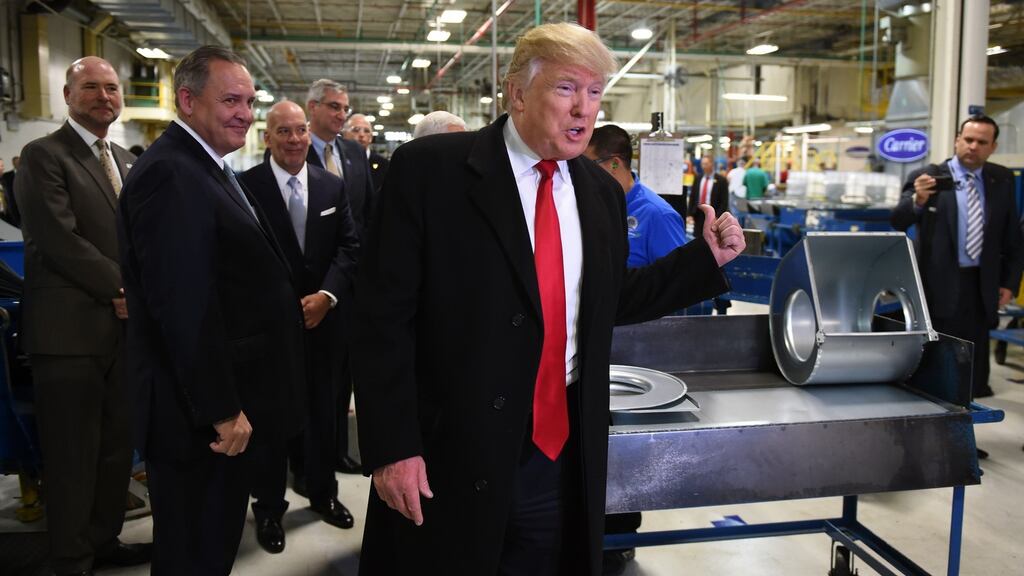 President-elect Donald Trump visits the Carrier air conditioning and heating company in Indianapolis, Indiana on Thursday. Photograph: Timothy Clary/AFP/Getty Images