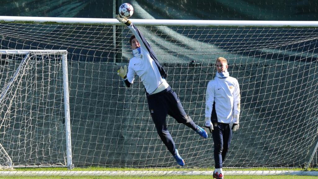 Manchester City’s Costel Pantilimon (left) trains with Joe Hart (right) at Carrington, Manchester. Photograph:  Martin Rickett/PA Wire.