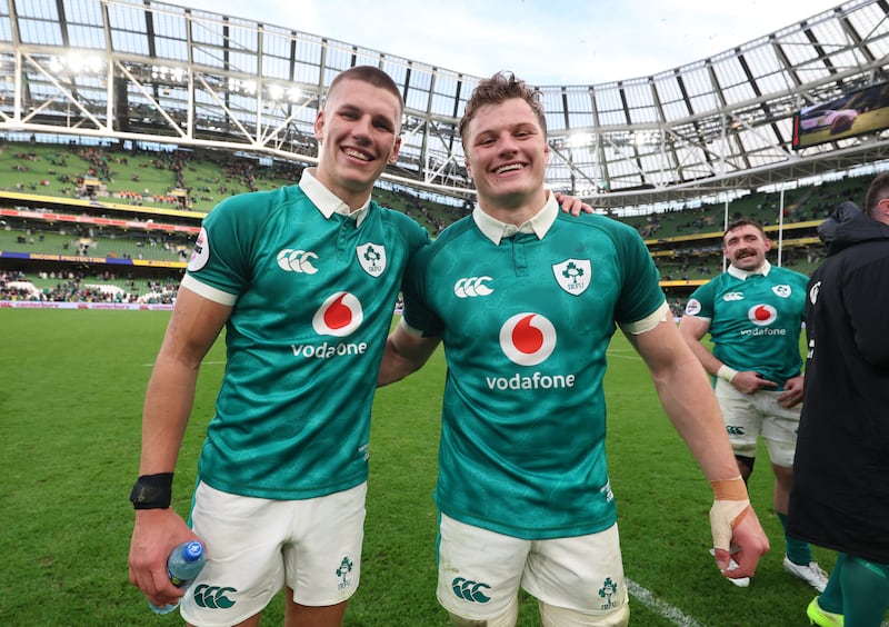 Ireland’s Sam Prendergast and Cian Prendergast celebrate after the match. Photograph: Billy Stickland/Inpho