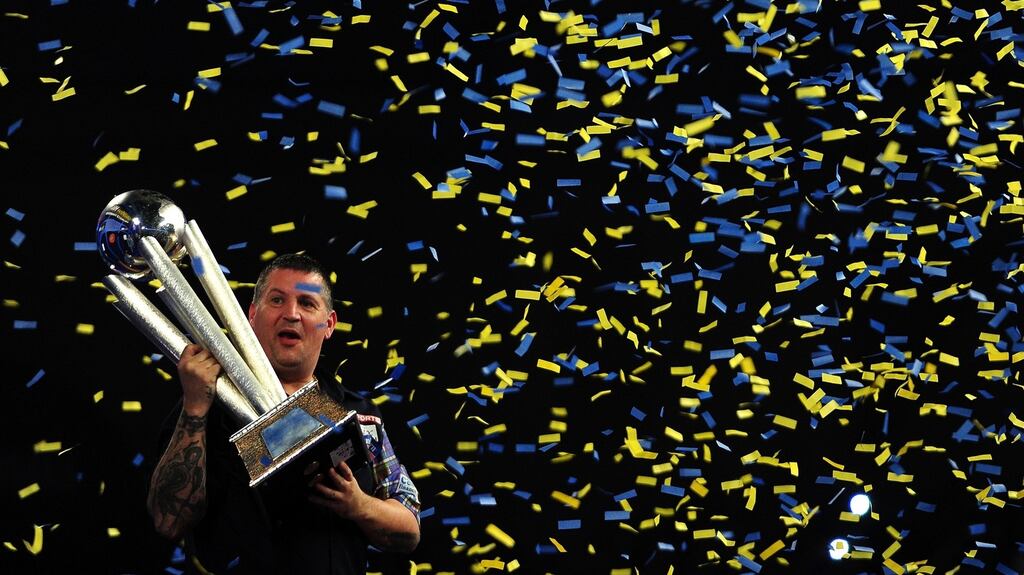 Gary Anderson retained the PDC World Championship with a 7-5 win over Adrian Lewis at the Alexandra Palace. Photograph: Getty