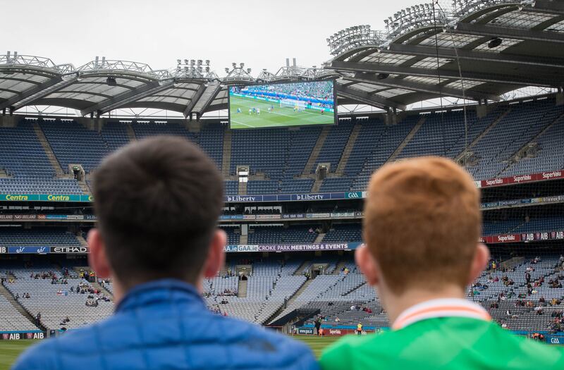 Kildare vs Westmeath Leinster GAA Football Senior Championship Semi-Final, Croke Park, 2016, where fans kept an eye on the Ireland v France game on the big screen. Photograph: Ryan Byrne/Inpho