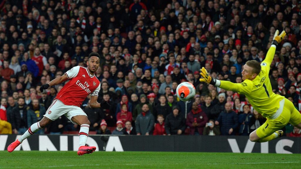 Arsenal’s Pierre-Emerick Aubameyang scores the second goal during their 3-2 Premier League win over Everton. Photo: Neill Hall/EPA