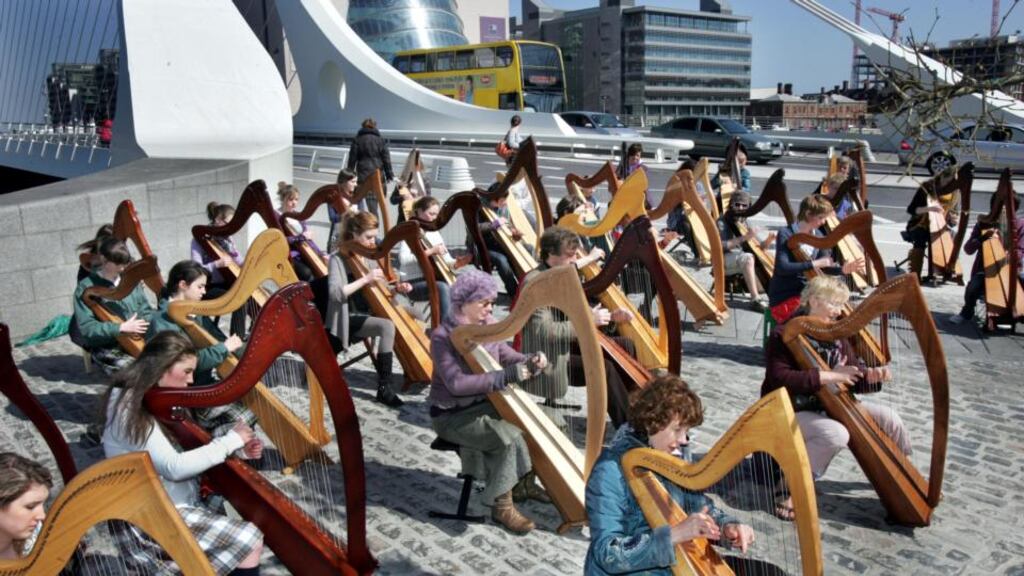 Harpers in an open-air concert on the Samuel Beckett Bridge, Dublin, to celebrate National Music Day in 2010. Photograph : Matt Kavanagh