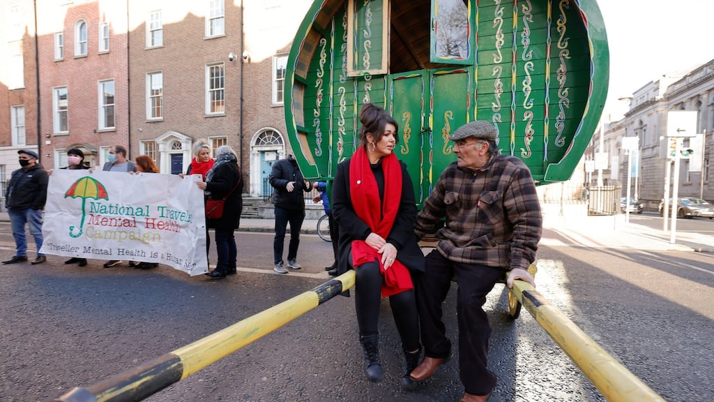 Margaret McDonagh, chair of the Traveller Mental Health Network, with tinsmith James Collins at a Traveller protest on International Human Rights Day. Photograph: Alan Betson