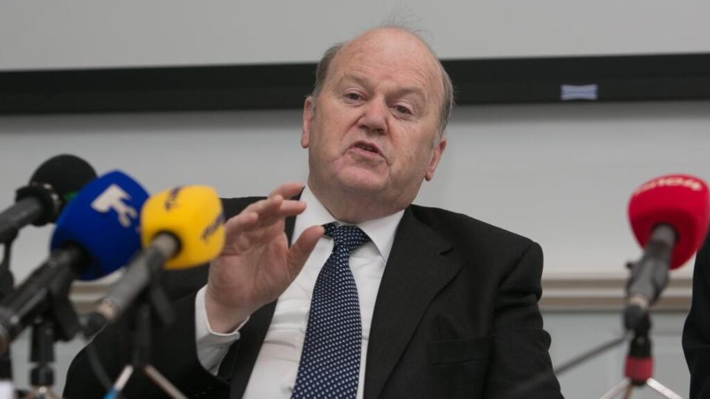 Minister for Finance Michael Noonan has hinted that budgetary measures could prevent the Universal Social Charge (USC) increasing from four to seven per cent for some taxpayers as scheduled.
Photograph: Gareth Chaney Collins