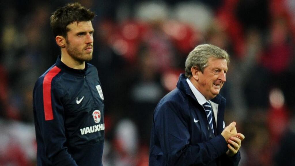 Manager Roy Hodgson and Michael Carrick look on as England qualify for the World Cup in Brazil after their Group H victory over Poland at Wembley Stadium, London. Photograph: Mike Hewitt/Getty Images