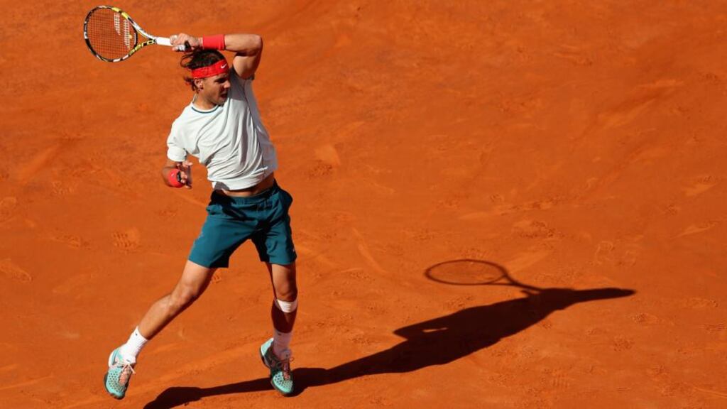 Rafael Nadal of Spain in action against Roger Federer of Switzerland in their final match at the Romae Masters. Photograph: Clive Brunskill/Getty Images