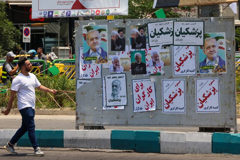 Electoral posters in Tehran. Photograph: Atta Kenare/AFP via Getty