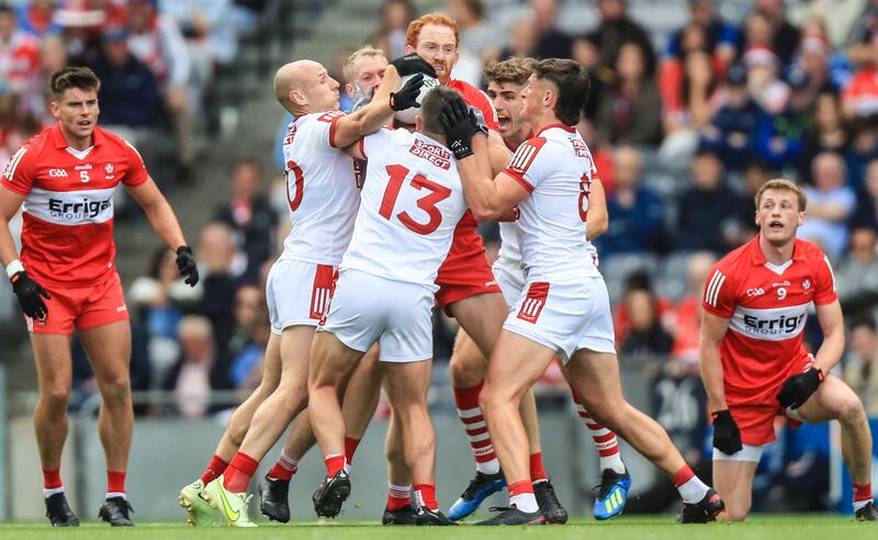 Conor Glass surrounded by Cork players during last year's All-Ireland quarter-final victory at Croke Park. Photograph: Evan Treacy/Inpho