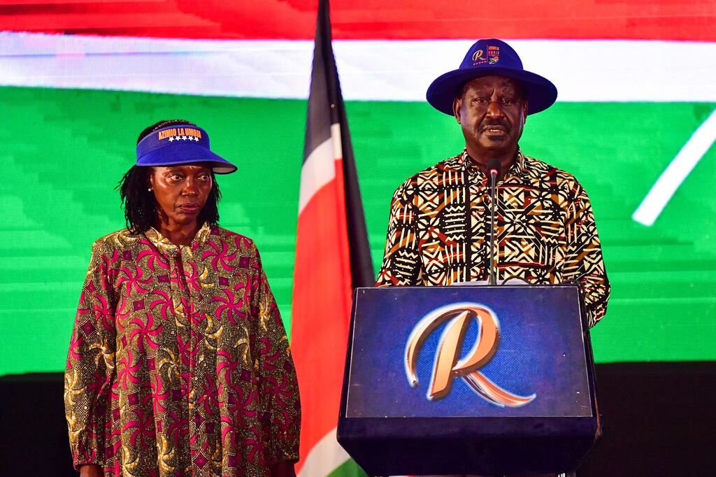 Kenya's defeated presidential candidate Raila Odinga with his running-mate Martha Karua. Mr Odinga was welcomed on stage at the Kenyatta International Convention Centre in Nairobi  as the 'president-elect'. Photograph: Tony Karumba/Getty Images