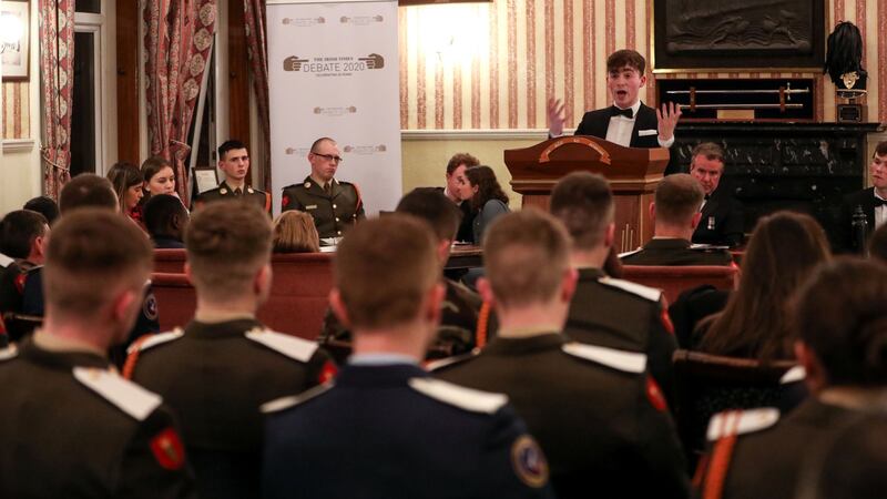 Killian Farrelly from UCD LawSoc speaking for the proposition during  the semi-final of the Irish Times Debate 2019-2020 in the cadets’ mess at  the Curragh Camp. Photograph: Crispin Rodwell