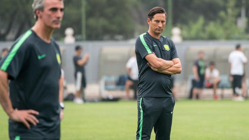 Beijing Guoan: Jim McGuinness with head coach Roger Schmidt. Photograph: VCG via Getty