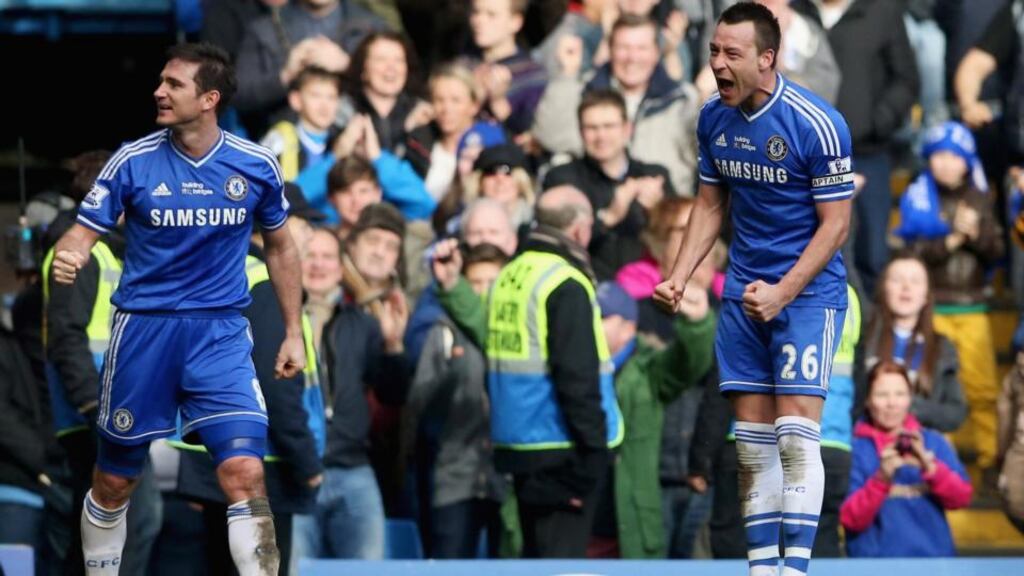 John Terry (right) celebrates his injury-time winner at the end of the Premier League clash with Everton at Stamford Bridge. Photograph: Scott Heavey/Getty Images