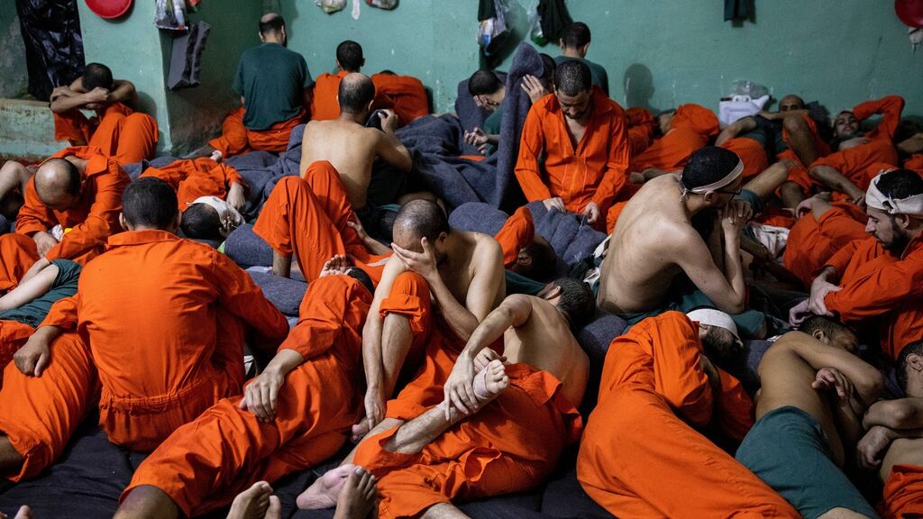 Suspected members of Islamic State in a prison run by Kurdish-led forces in Syria. Ivor Prickett/New York Times