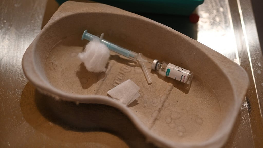 A spent syringe and empty vial of the AstraZeneca vaccine sits on a table at a temporary vaccine centre in Hull, northeast England. Photograph: Oli Scarff/AFP via Getty Images