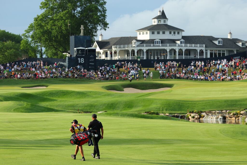 Xander Schauffele of the United States and his caddie, Austin Kaiser, walk the 18th fairwayduring the second round of the 2024 PGA Championship at Valhalla. Photograph: Andrew Redington/Getty Images