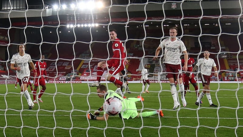 Liverpool’s Andrew Robertson scores his side’s second goal against Arsenal. Photograph: Jason Cairnduff/PA