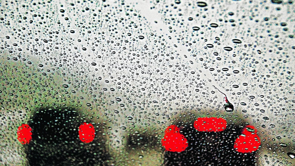 Heavy rain and strong winds are expected to make driving conditions difficult on Easter Monday.