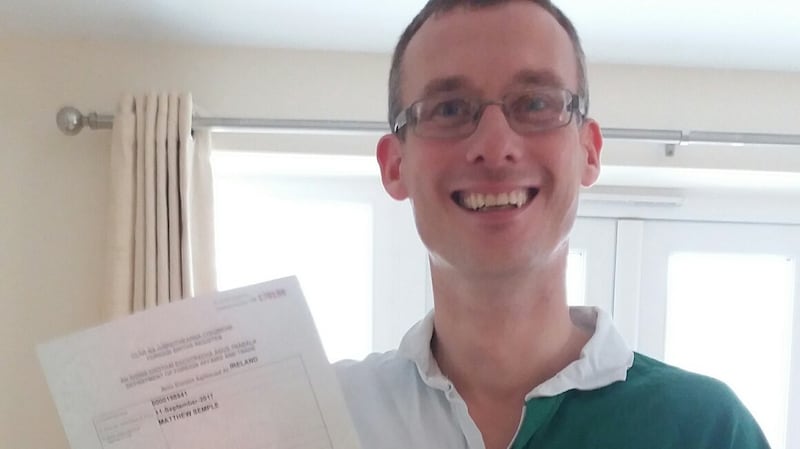 Matthew Semple with his certificate of foreign birth registration