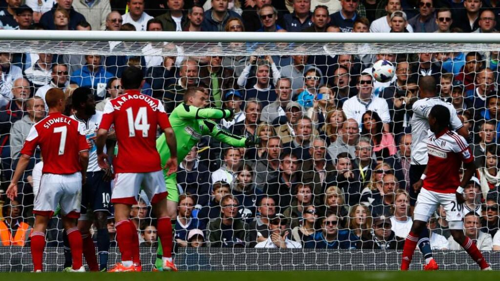 Tottenham Hotspur’s Younes Kaboul scores  against Fulham during the Premier League  match at White Hart Lane. Photograph: Eddie Keogh/Reuters