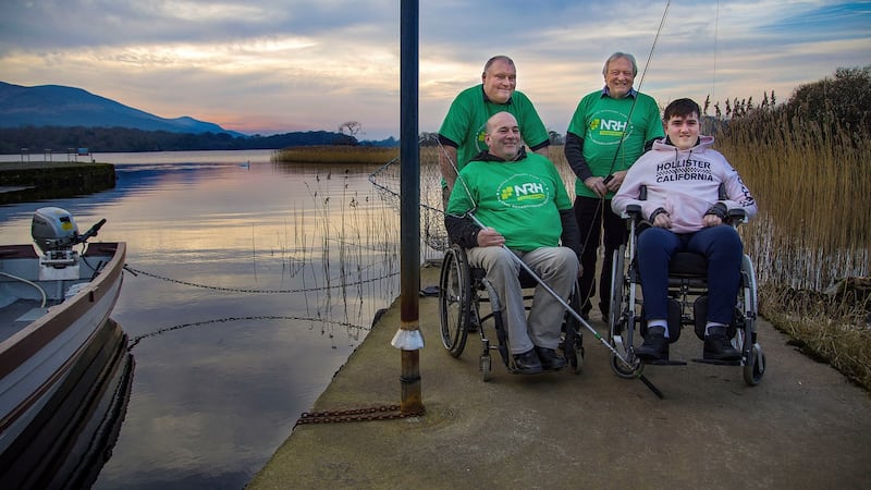 Timo O’Sullivan (left) and Ian O’Connell with committee members Phil Horan and Pádraic Coughlan at Reen Pier, Lough Lein, Killarney