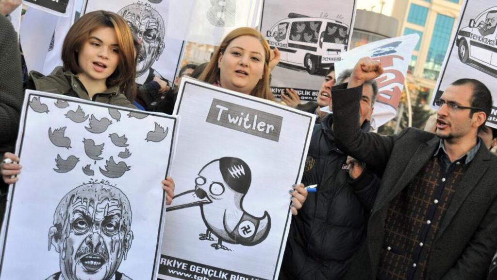 Demonstrators, members of the Turkish Youth Union, shout anti-government slogans during a protest against a Twitter ban, in Ankara yesterday. Photograph: Reuters