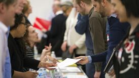 US jobless claims fall less than expected
