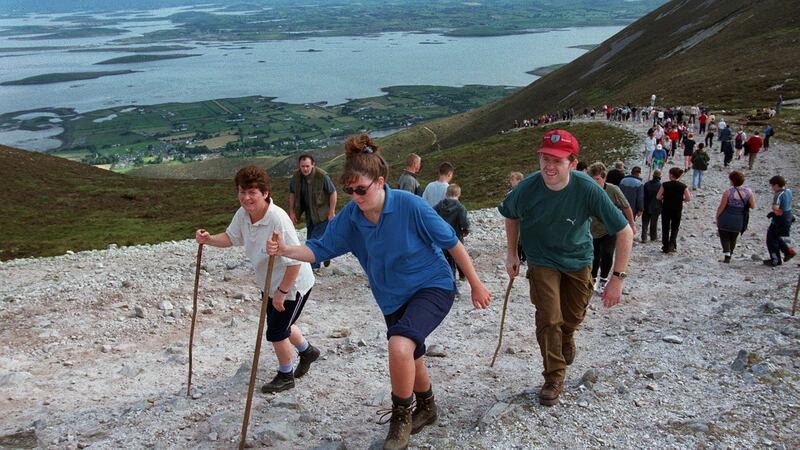 Clew Bay forms a backdrop for pilgrims on The Reek, or Croagh Patrick, in Co Mayo. Photograph: Matt Kavanagh