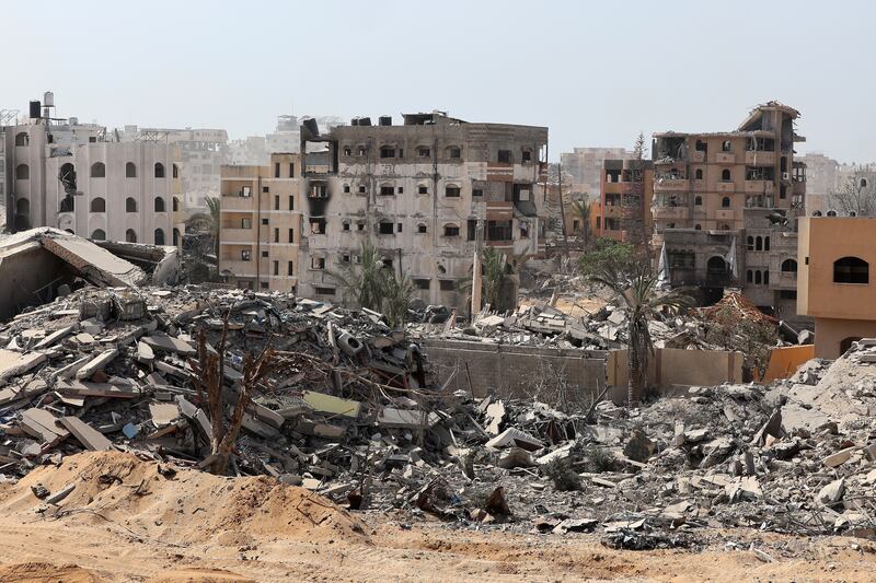 Destroyed buildings in Gaza city after Israeli air strikes. Photograph: Jack Guez/Pool/AP