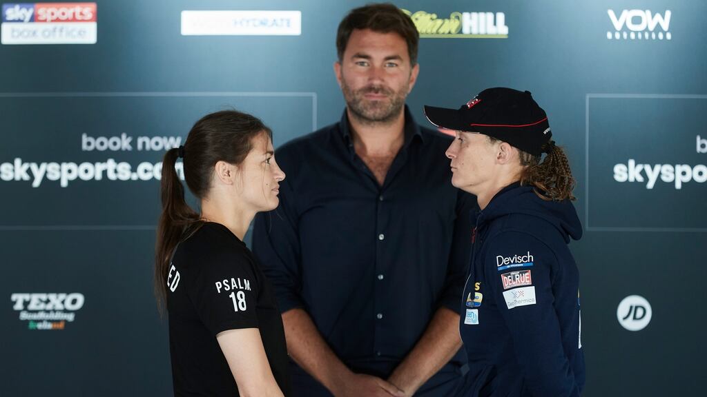 Katie Taylor and Delfine Persoon with promoter Eddie Hearn at a press conference in Essex prior to their rematch on Saturday night. Photograph: Mark Robinson/Inpho
