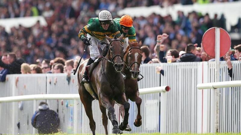 Carlingford Lough ridden by jockey Tony McCoy comes home to win the Galway Plate ahead of Quantitativeeasing ridden by jockey Niall ‘Slippers’ Madden. Photo: James Crombie/Inpho