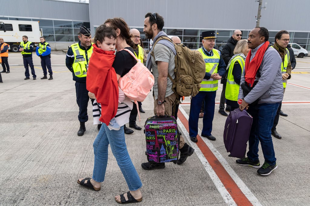 Passengers disembark from a plane in Roissy airport, near Paris, France. Photograph: Christophe Petit Tesson/EPA