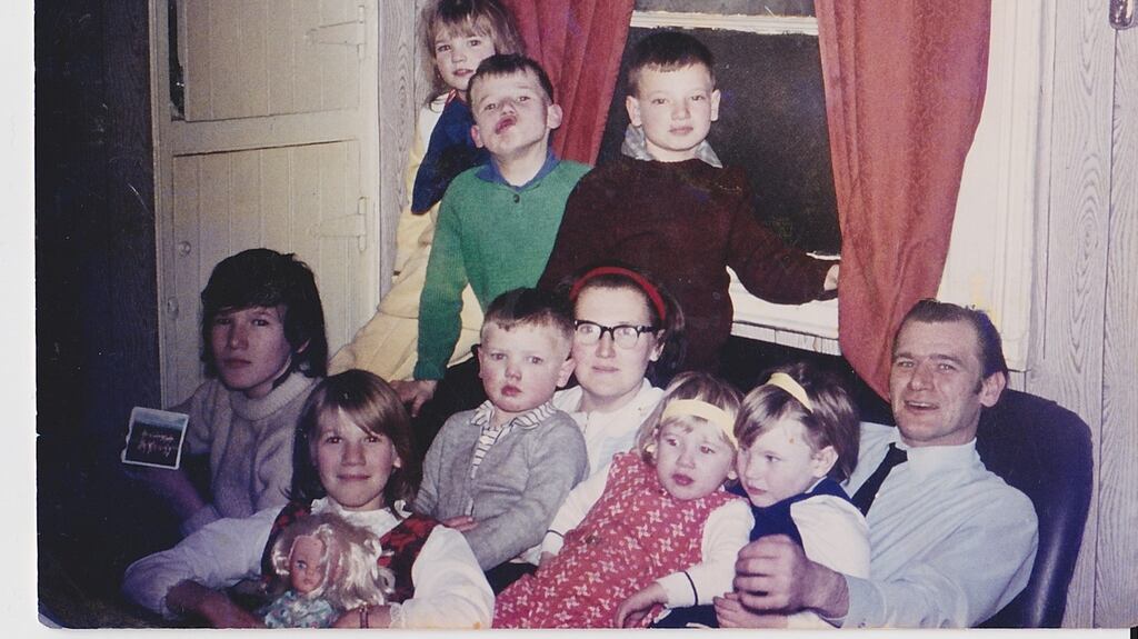 Martha Campbell, front row, first from left, with her parents and siblings in a rare family photograph the Christmas before she was killed. Her brother Tony is behind her right shoulder. Photograph courtesy Campbell family