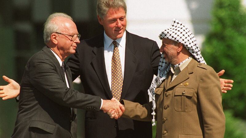 Israeli prime minister Yitzhak Rabin and Palestinian leader Yasser Arafat with Bill Clinton after the signing of the first Oslo Accord at the White House in September 1993. Photograph: Ron Edmonds