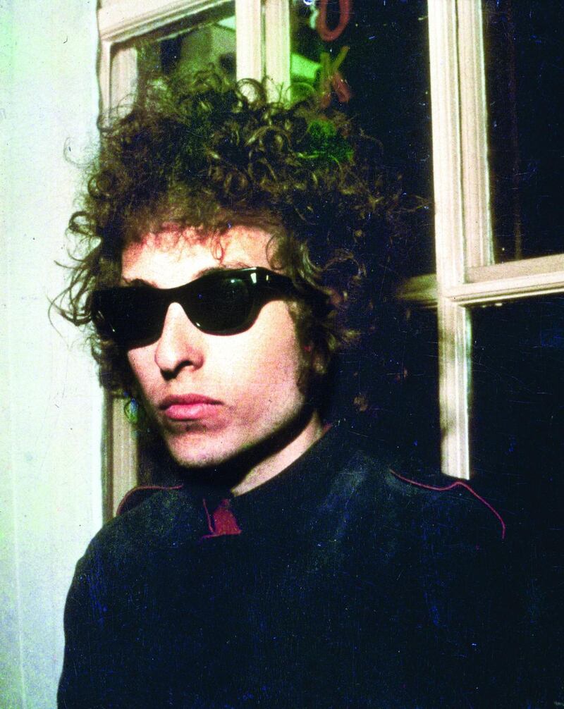 1966: A headshot of American singer Bob Dylan wearing sunglasses, London, England. (Photo by Blank Archives/Getty Images)