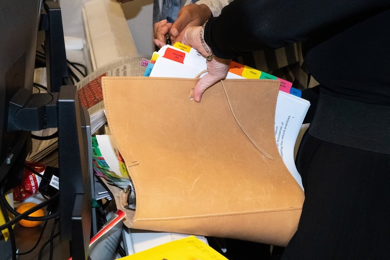 Psaki’s overflowing briefing book. Photograph: Peter van Agtmael/New York Times